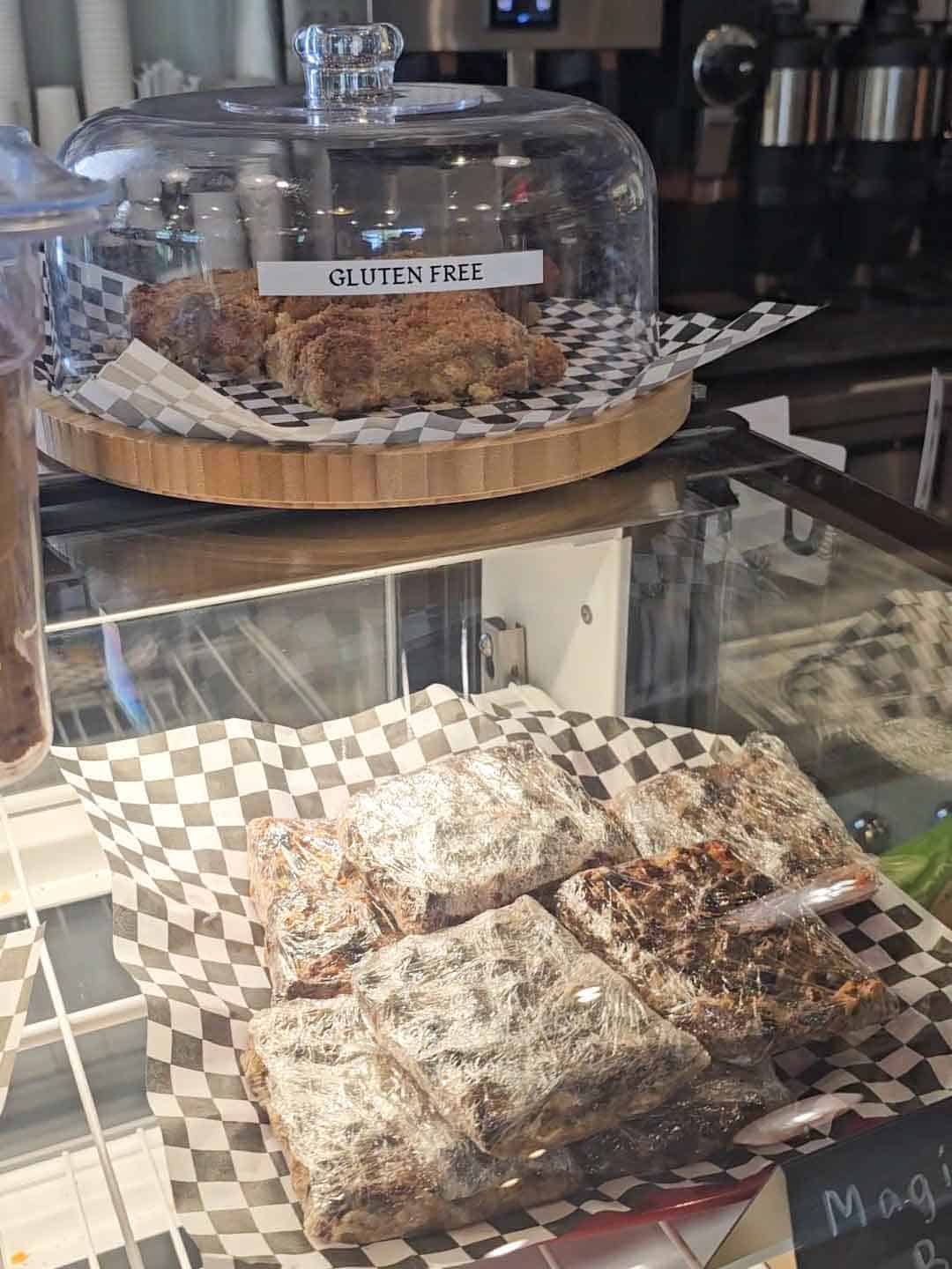 bakery case with a gluten free coffee cake