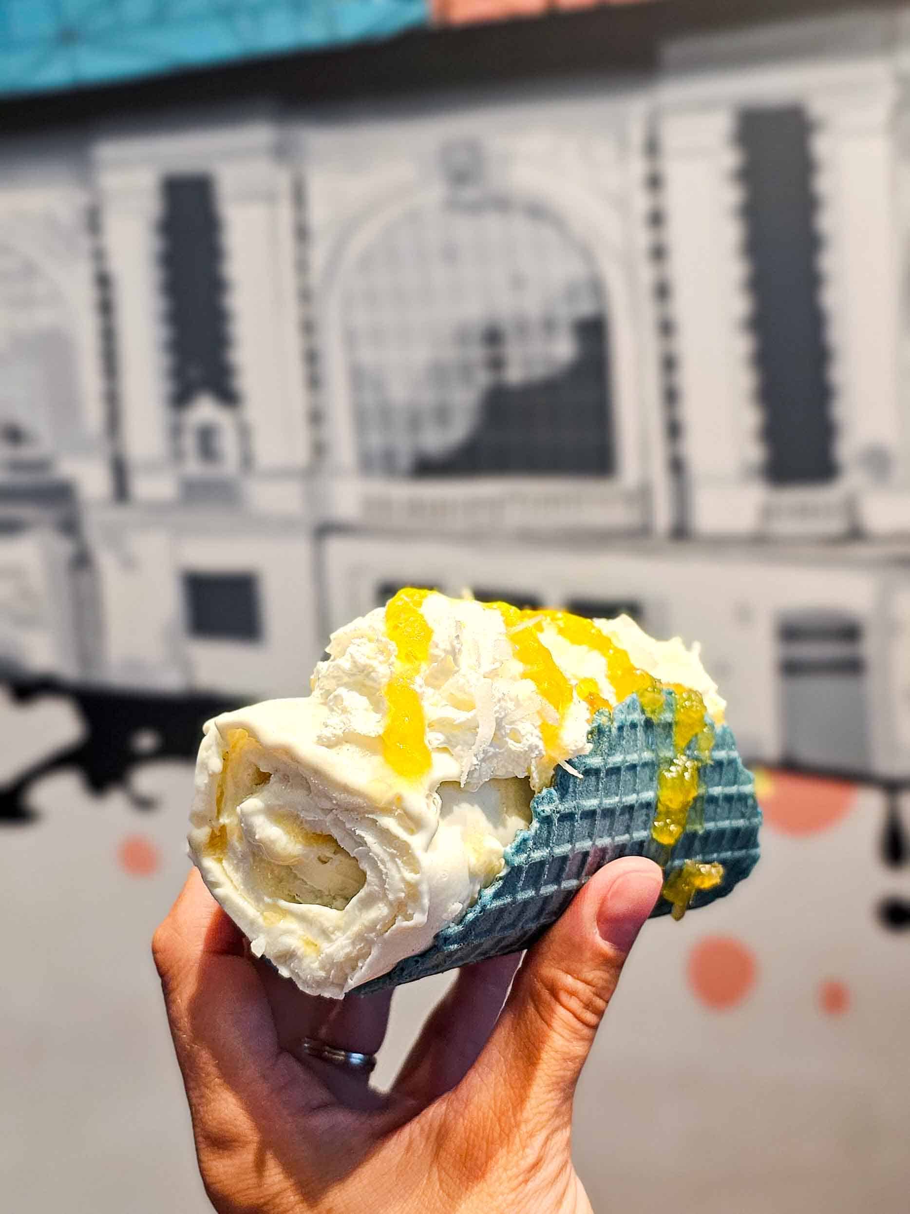 rolled ice cream in a blue taco shell