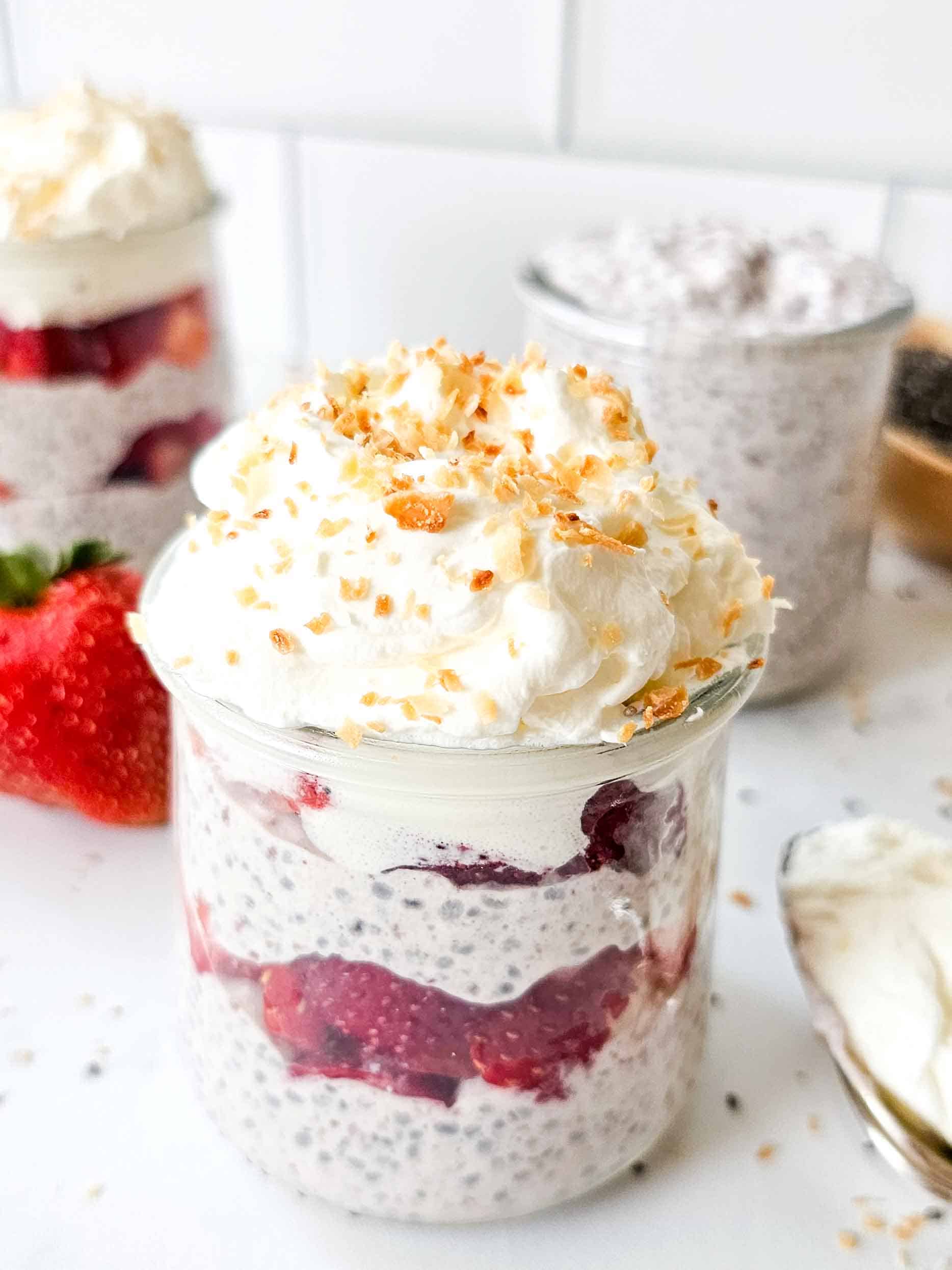 chia pudding and strawberries layered in a jar