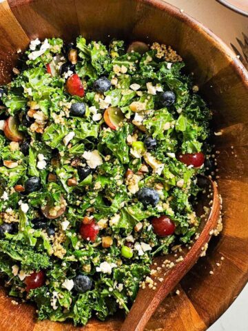 kale salad in a wooden bowl