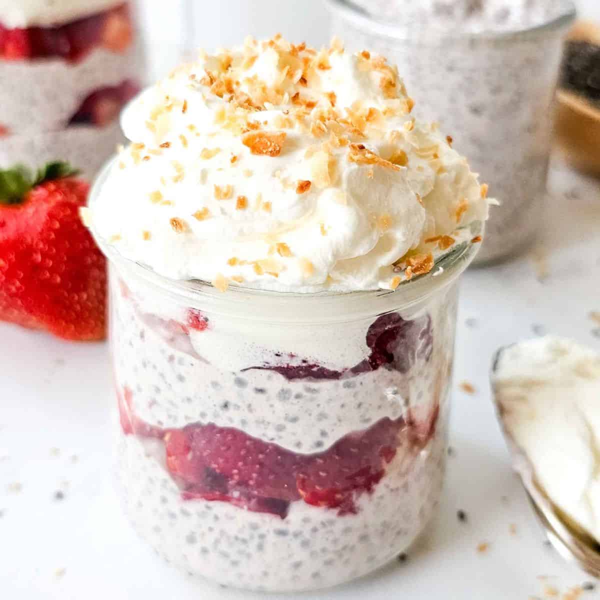 jar with layers of chia pudding and strawberries